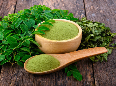Export-grade dried moringa leaves (drumstick leaves) from VegTradeHub showing vibrant green color and uniform grading